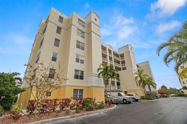 1200 Country Club Dr Unit 3303, Largo, FL 33771 - view of property featuring uncovered parking