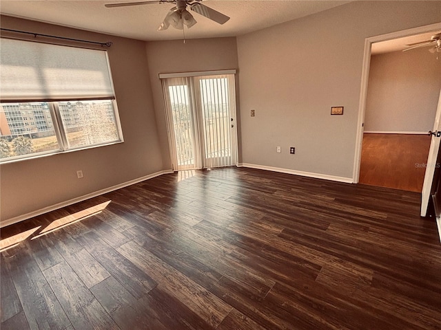 1200 Country Club Dr Unit 3303, Largo, FL 33771 - empty room featuring wood finished floors, a ceiling fan, and baseboards