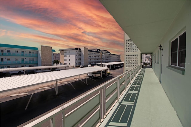 view of balcony at dusk