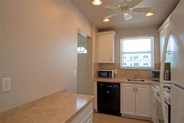 kitchen with light tile patterned floors, recessed lighting, dishwasher, and light countertops