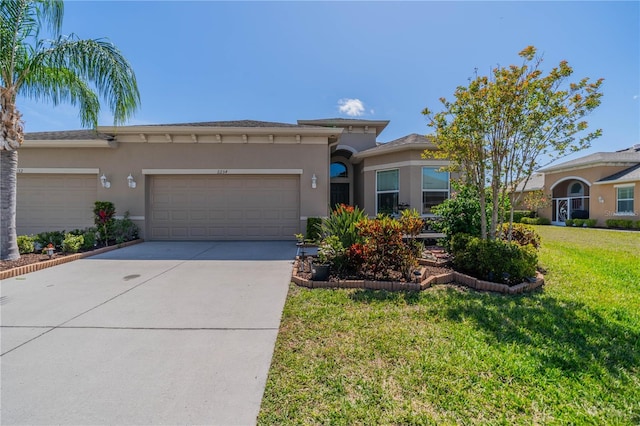 2234 Nottingham Greens Dr Unit 2234, Sun City Center, FL 33573 - view of front of home featuring a front yard, concrete driveway, an attached garage, and stucco siding