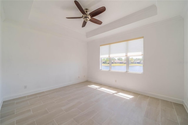 2234 Nottingham Greens Dr Unit 2234, Sun City Center, FL 33573 - empty room featuring a tray ceiling, ornamental molding, baseboards, and ceiling fan