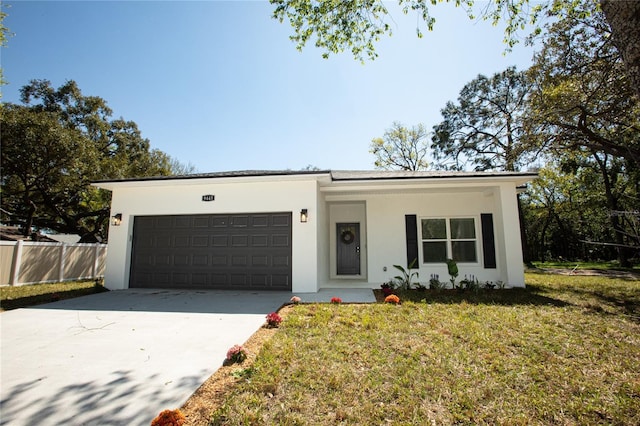 9445 Eldridge Rd, Spring Hill, FL 34608 - view of front of property with stucco siding, an attached garage, and driveway