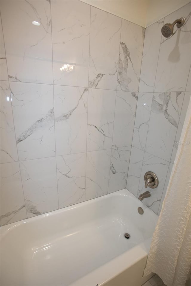 9445 Eldridge Rd, Spring Hill, FL 34608 - bathroom with shower / bathtub combination with curtain