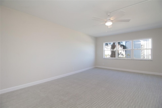 1621 Gulf Blvd Unit 308, Clearwater Beach, FL 33767 - spare room featuring light colored carpet and ceiling fan
