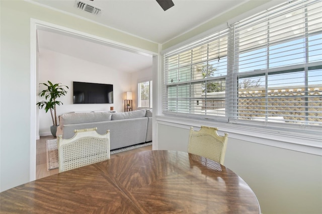 dining space featuring visible vents