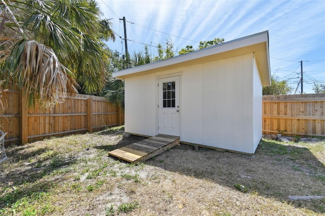 view of shed featuring a fenced backyard