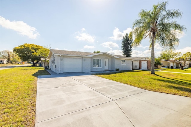 ranch-style house featuring driveway, a front lawn, and a garage