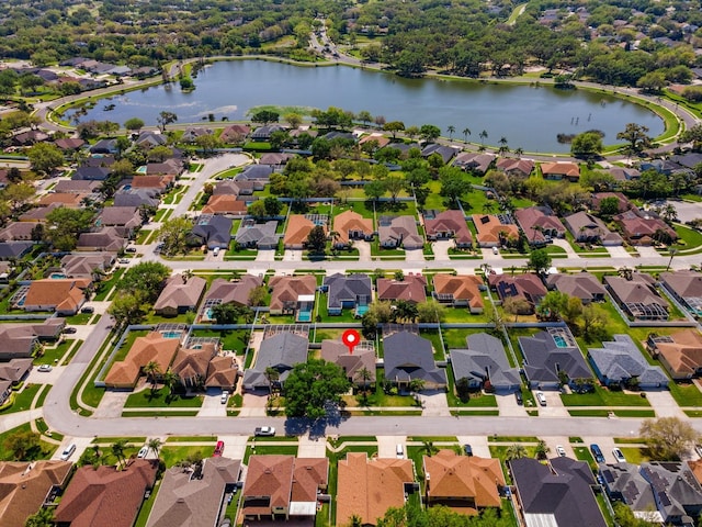 5123 Whispering Leaf Trl, Valrico, FL 33596 - aerial perspective of suburban area featuring a large body of water