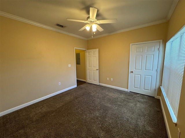 18575 Bridle Club Dr Unit 18575, Tampa, FL 33647 - unfurnished bedroom with baseboards, dark carpet, visible vents, and crown molding