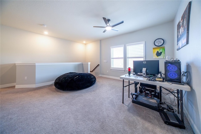 home office with baseboards, a ceiling fan, and carpet floors