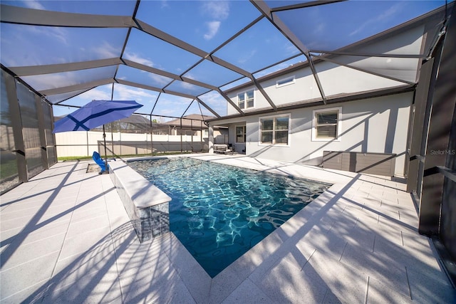 view of pool with a lanai, a fenced in pool, a patio, and a fenced backyard