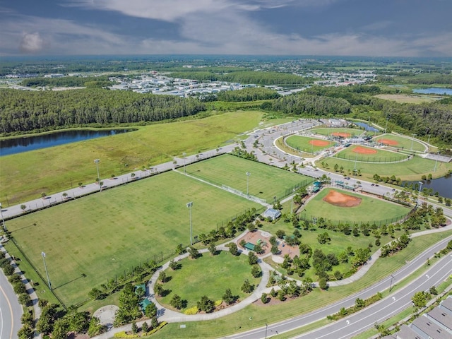 drone / aerial view featuring a rural view and a water view