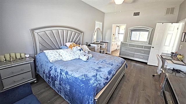 25631 Bruford Blvd, Land O Lakes, FL 34639 - bedroom featuring dark wood-type flooring, ceiling fan, and ensuite bathroom