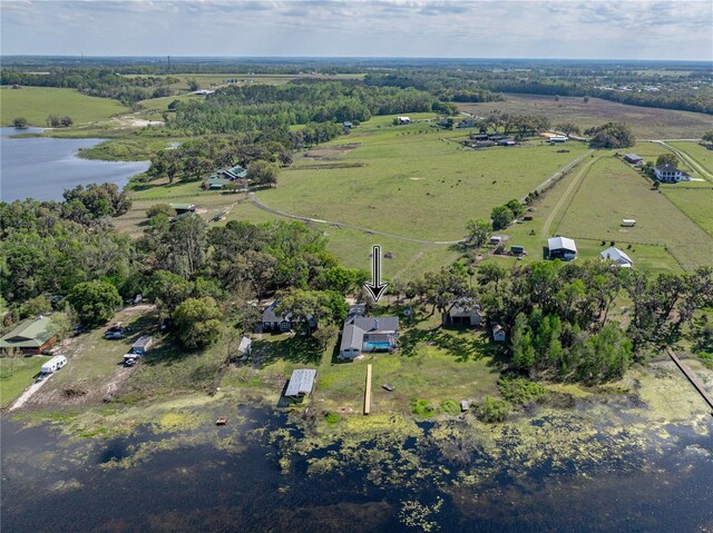 aerial view with a water view and a rural view