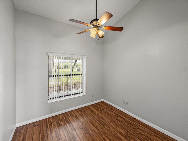 unfurnished room featuring baseboards, wood finished floors, and a ceiling fan