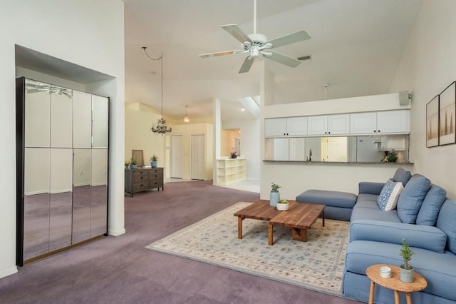 2991 Covewood Pl, Clearwater, FL 33761 - carpeted living area with a ceiling fan and high vaulted ceiling