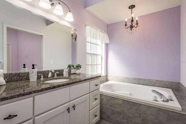 2991 Covewood Pl, Clearwater, FL 33761 - bathroom featuring vanity, a chandelier, and a bath