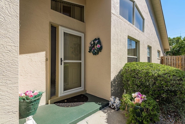 2991 Covewood Pl, Clearwater, FL 33761 - view of exterior entry featuring stucco siding