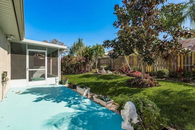 2991 Covewood Pl, Clearwater, FL 33761 - view of yard with a sunroom and a patio area