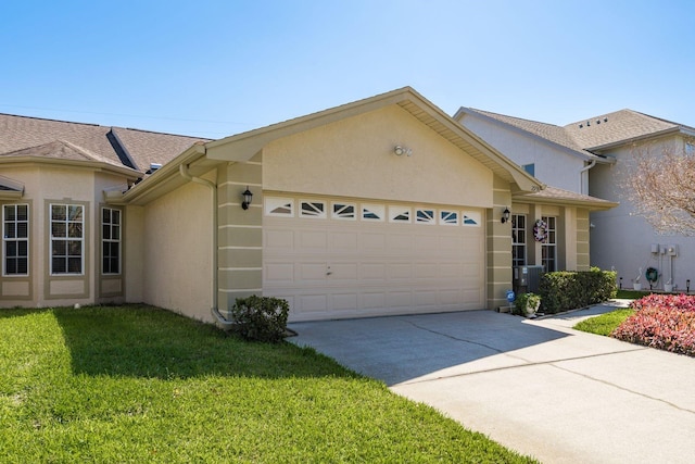 2991 Covewood Pl, Clearwater, FL 33761 - view of front of house featuring stucco siding, a garage, driveway, and a front yard