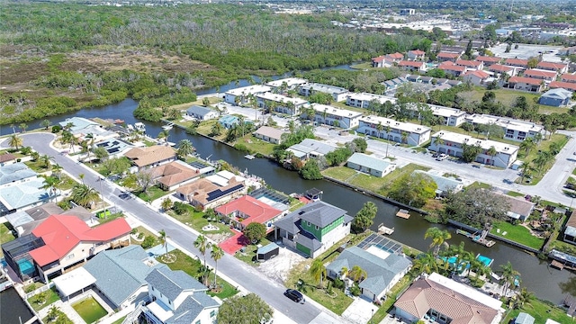 bird's eye view with a residential view and a water view