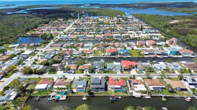 aerial view with a residential view and a water view