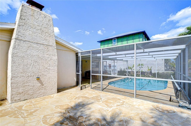 pool featuring a patio and a lanai