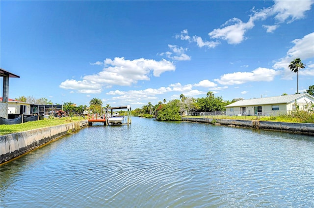 property view of water featuring a boat dock