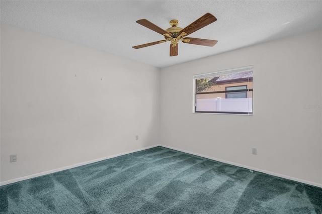 2462 Indian Trl E, Palm Harbor, FL 34683 - carpeted empty room featuring a textured ceiling, a ceiling fan, and baseboards