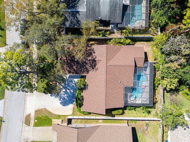 2462 Indian Trl E, Palm Harbor, FL 34683 - aerial view of property and surrounding area featuring a pool area