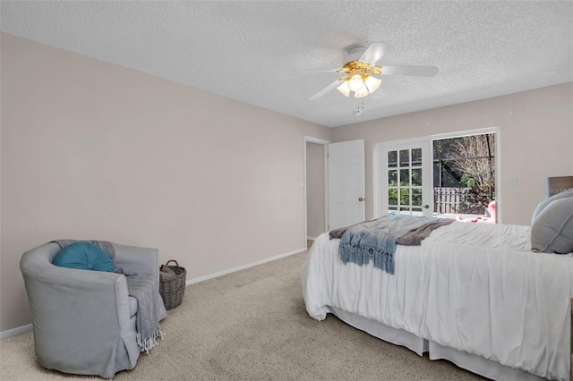 2462 Indian Trl E, Palm Harbor, FL 34683 - bedroom with carpet floors, access to outside, baseboards, a textured ceiling, and a ceiling fan
