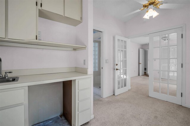 2462 Indian Trl E, Palm Harbor, FL 34683 - unfurnished office featuring ceiling fan, light carpet, a sink, and french doors