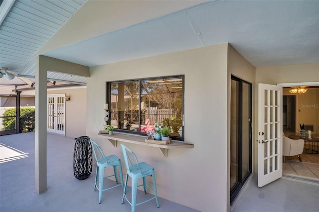 2462 Indian Trl E, Palm Harbor, FL 34683 - view of patio with french doors