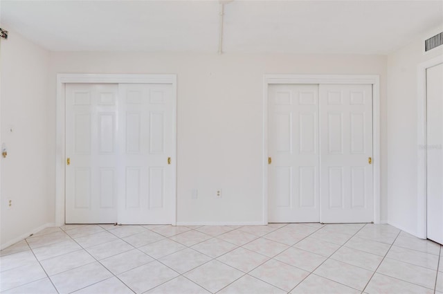 unfurnished bedroom with baseboards