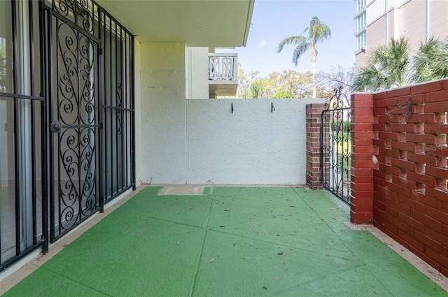 view of patio / terrace with a gate