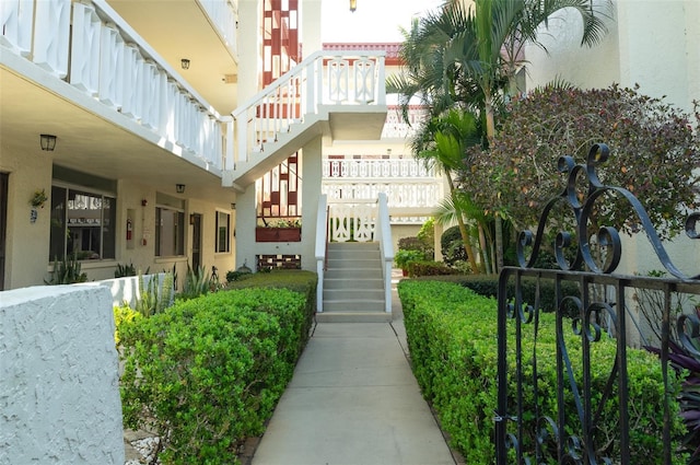 view of home's community featuring stairway