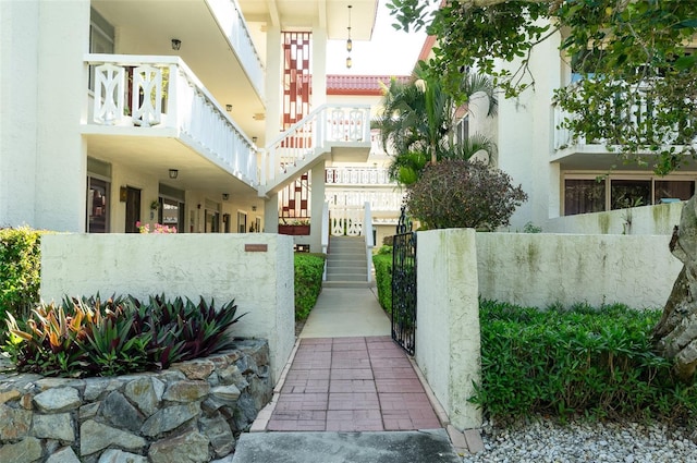 view of home's community with stairway