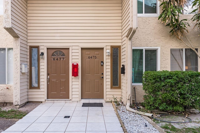 6475 23rd St N, Saint Petersburg, FL 33702 - entrance to property with stucco siding