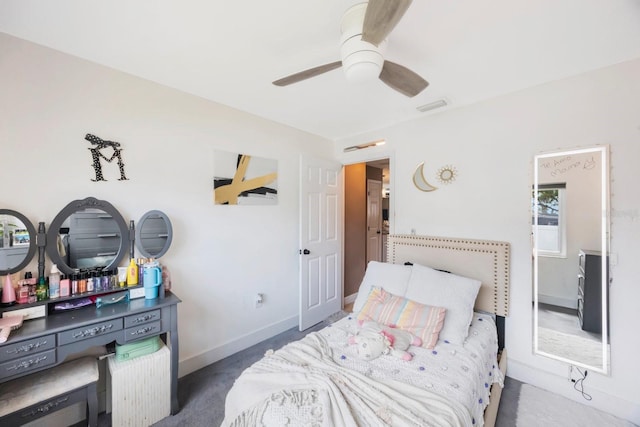 bedroom with visible vents, baseboards, and a ceiling fan