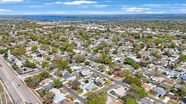 aerial view featuring a residential view and a water view