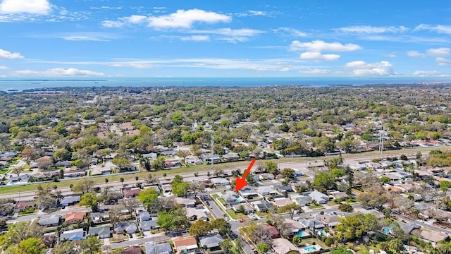 birds eye view of property with a residential view