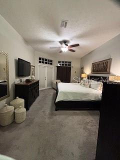 bedroom featuring visible vents and a ceiling fan