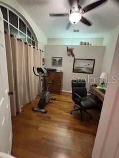 home office featuring ceiling fan and wood finished floors