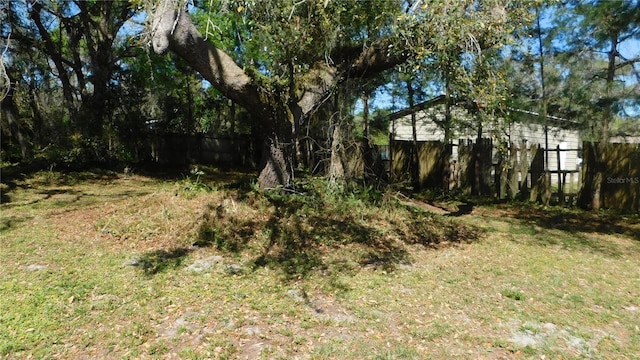 view of yard with fence