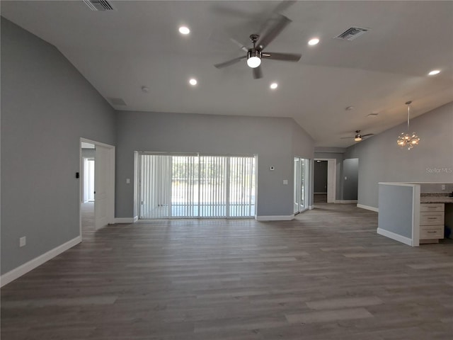 26 Clintwood Ave, Englewood, FL 34223 - unfurnished living room with a ceiling fan, wood finished floors, high vaulted ceiling, and recessed lighting