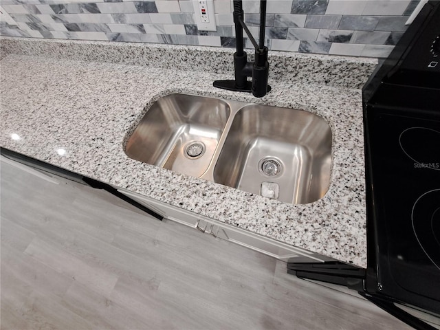 26 Clintwood Ave, Englewood, FL 34223 - kitchen view of backsplash and stone countertops