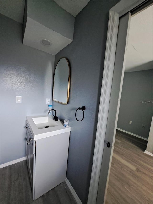 26 Clintwood Ave, Englewood, FL 34223 - bathroom featuring vanity and wood finished floors
