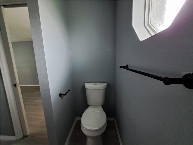 26 Clintwood Ave, Englewood, FL 34223 - bathroom featuring toilet and wood finished floors