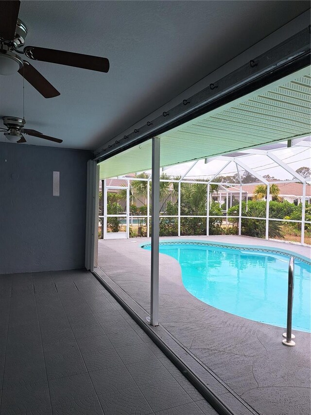 26 Clintwood Ave, Englewood, FL 34223 - swimming pool with a ceiling fan, a patio, and a lanai